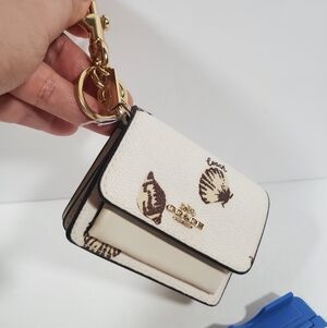 NWT Coach Mini Klare Bag Charm With Shell Print Gold/Chalk Multi CBL09